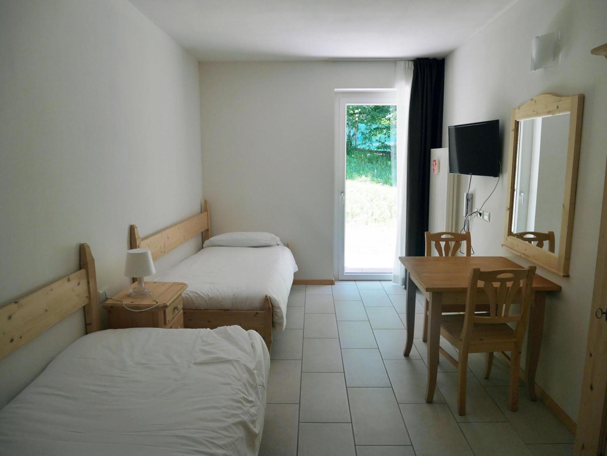 Hotel Elbele Garni Folgaria Habitación foto