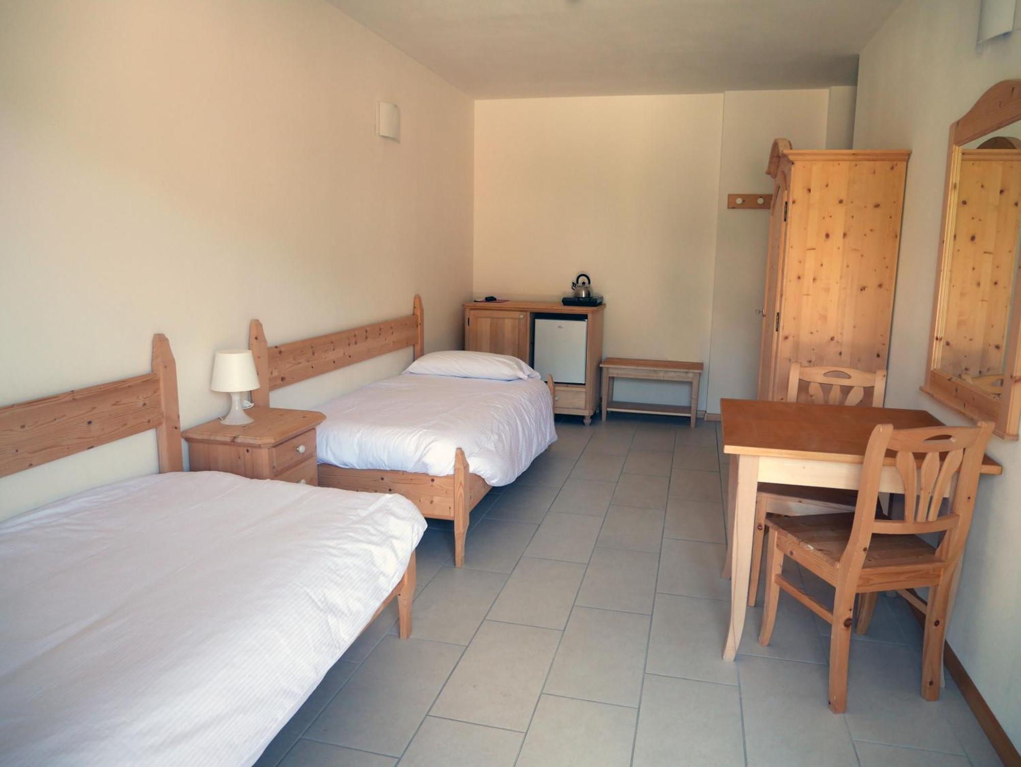 Hotel Elbele Garni Folgaria Habitación foto